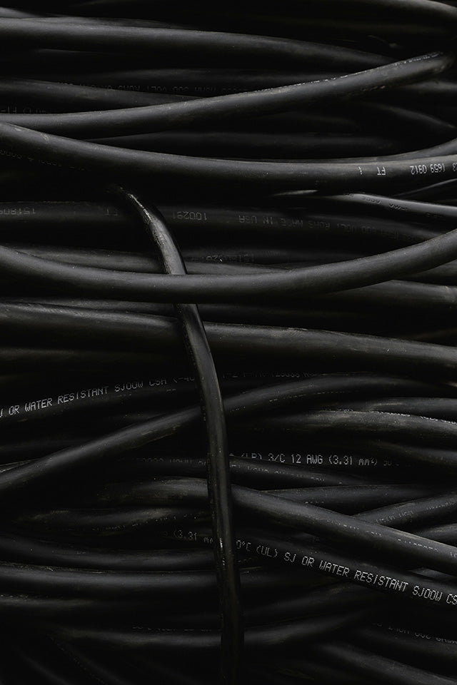 Cable de uso rudo negro enrollado de 3 conductores calibre 12 AWG