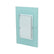 Placa armada Sanelec Venecia Aqua con apagador sencillo, diseño en color agua y marco cromado para uso exterior.