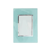 Placa armada Sanelec Venecia Aqua con apagador de escalera para exteriores, color azul claro y acabado brillante.
